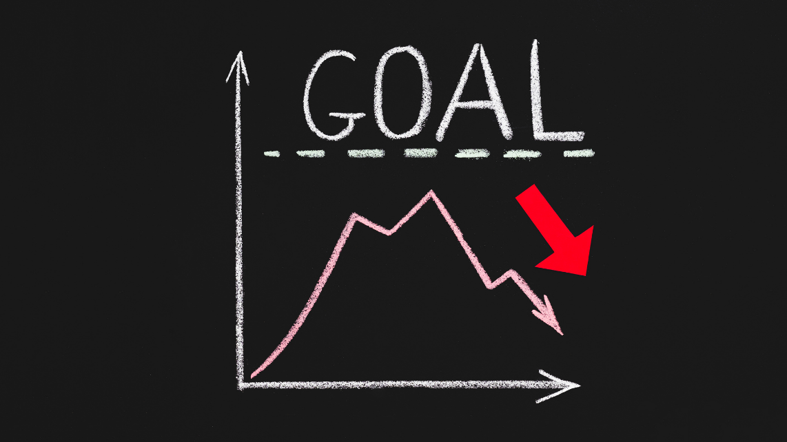 Decrease chart drawn in chalk on black background, emphasising unmet goals